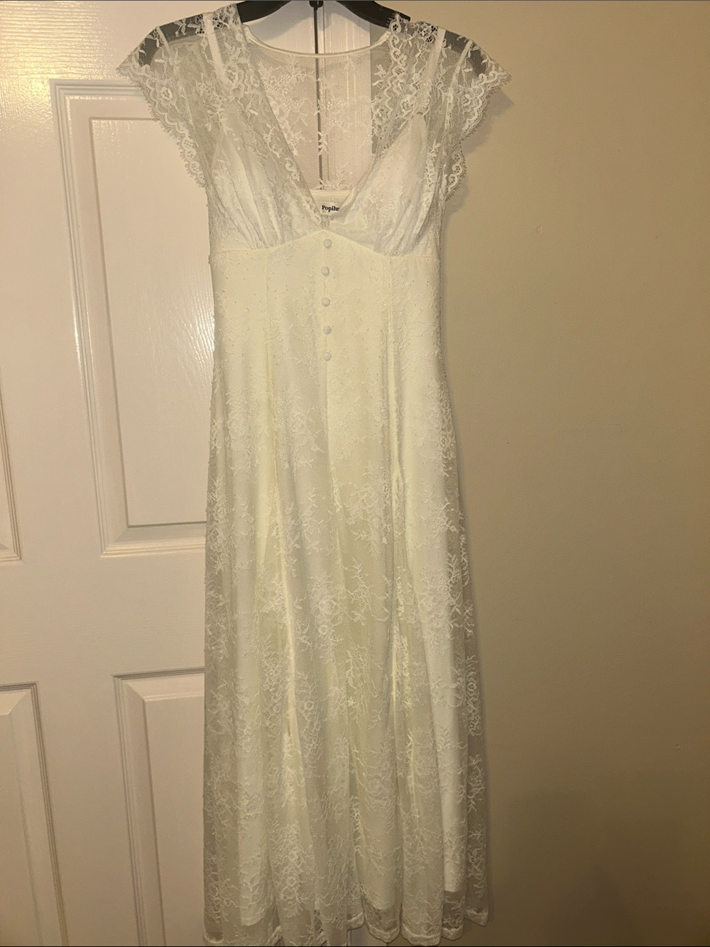 Popilush : New With Tags Cream lace dress with built in shape wear.